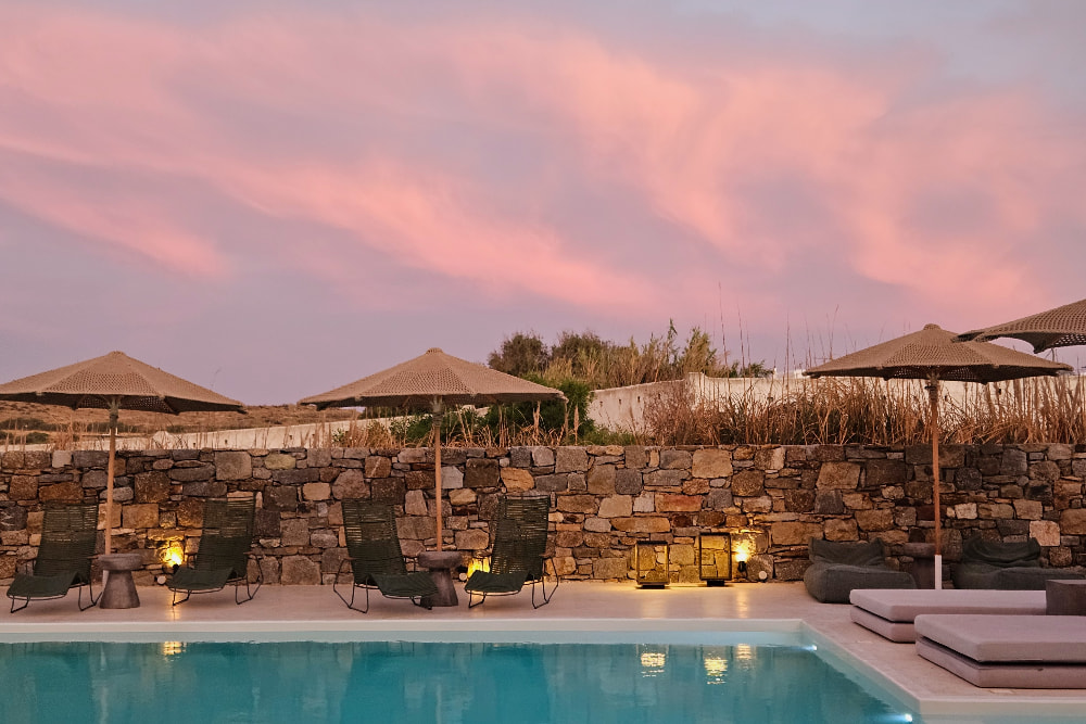 Sunset over the pool at Koukoumi
