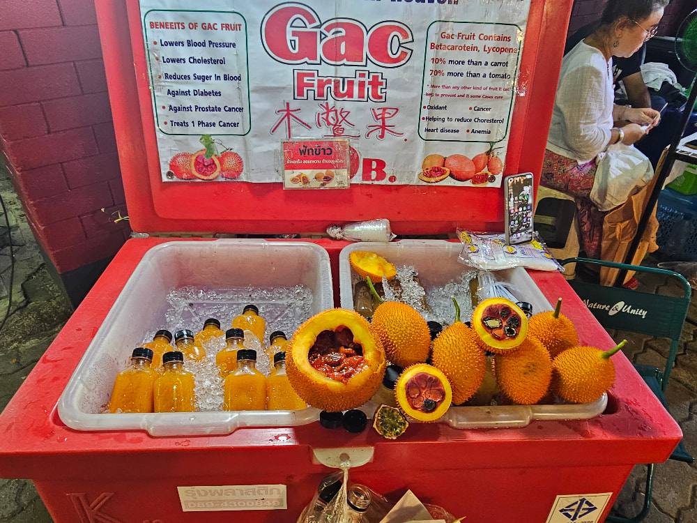 Gac fruit and passion fruit juice at the Sunday Night Market in Chiang Mai, Thailand