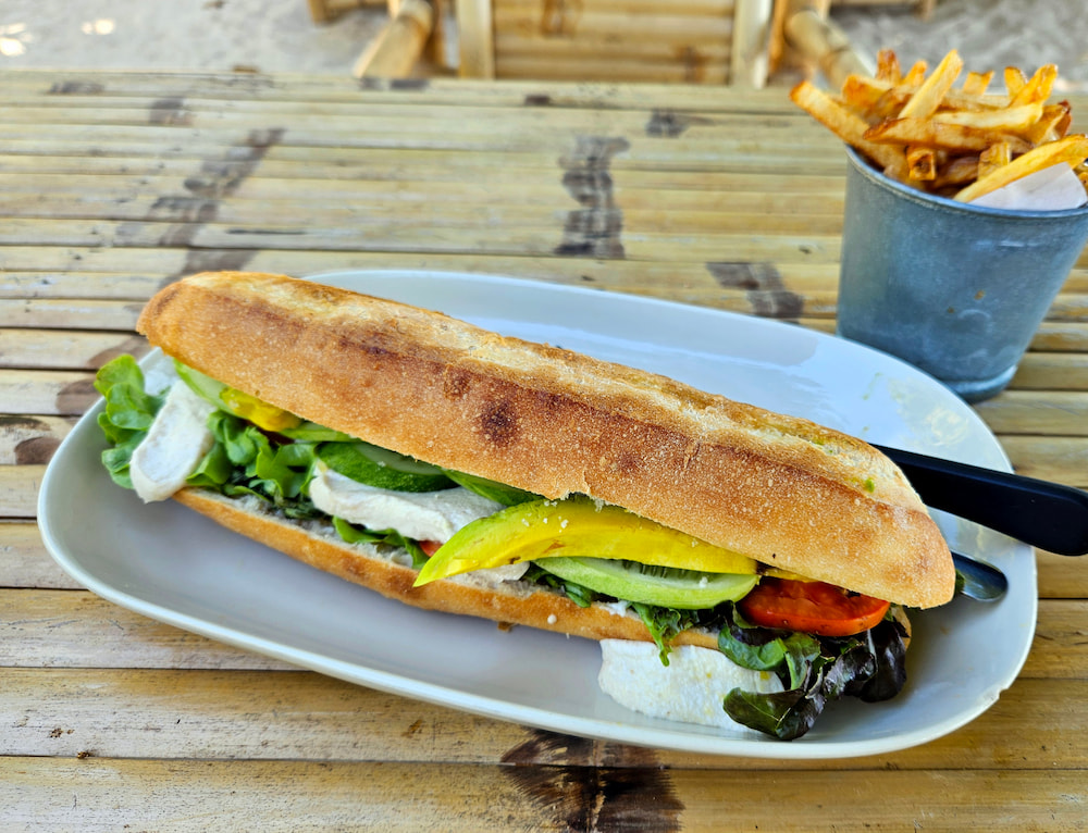 Vegan hotel breakfast in Koh Phangan, Thailand: Caprese sandwich with vegan mozzerella at Seaflower Bungalows