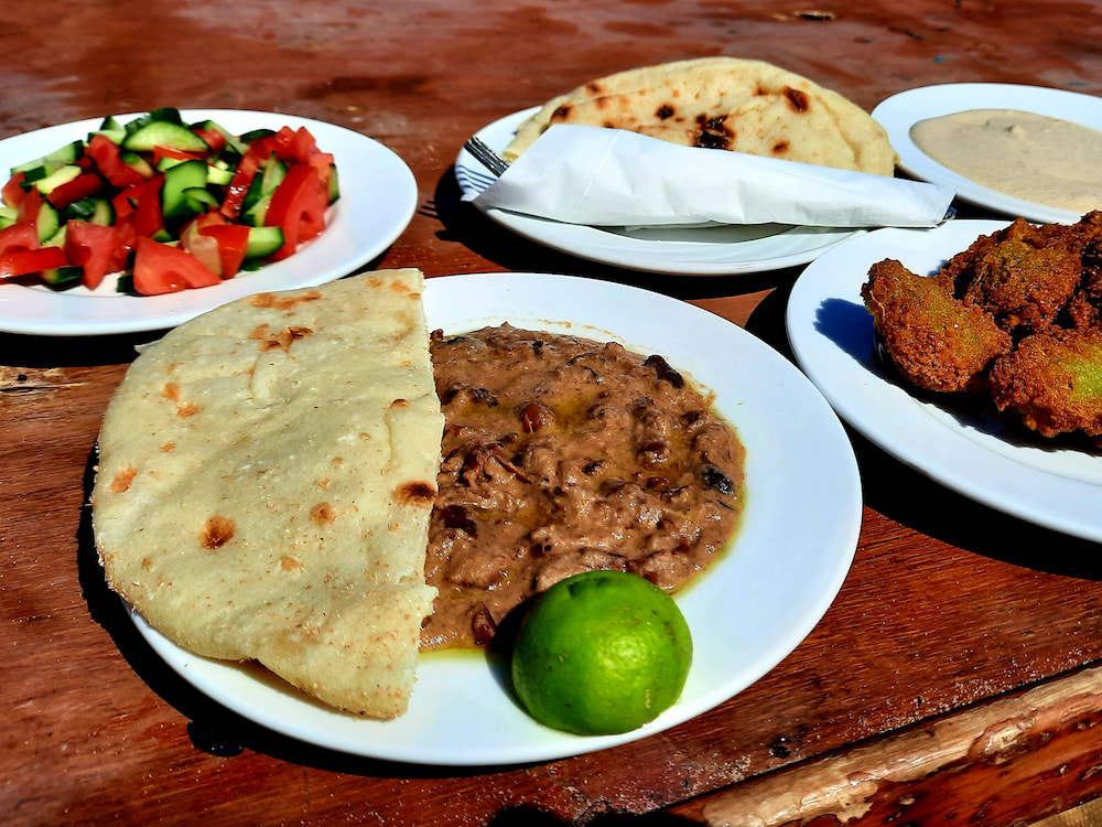 Vegan breakfast in Sinai: Traditional Egyptian breakfast with ful medames and falafel